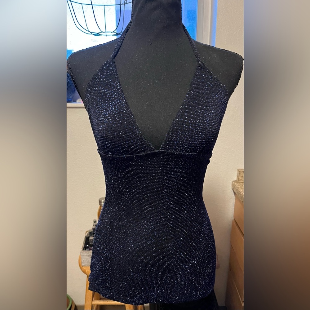 A blue sparkly bodysuit